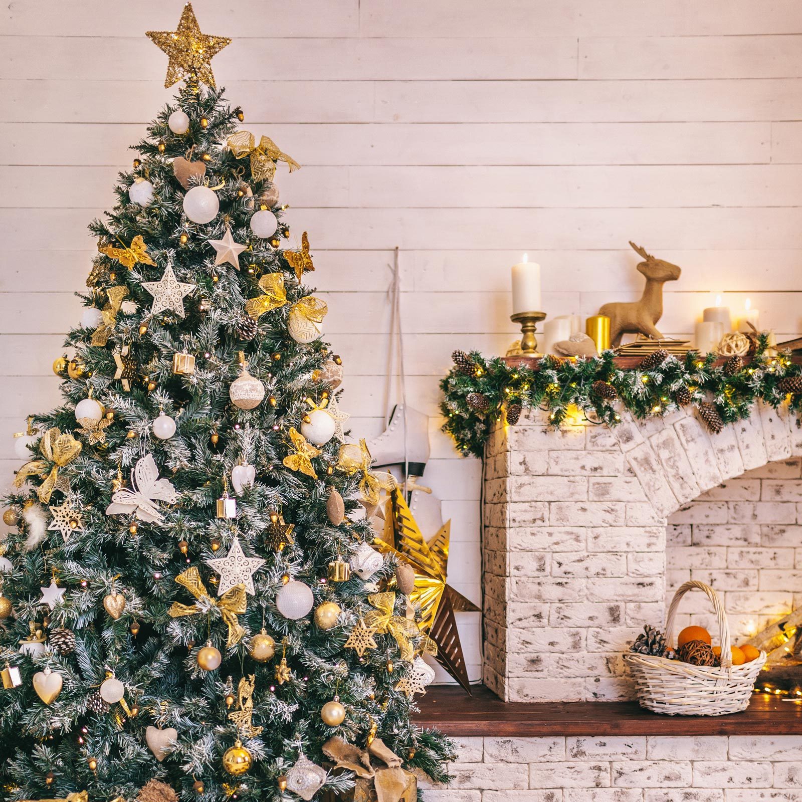 Christmas tree decorated in layers of gold ornaments and beads