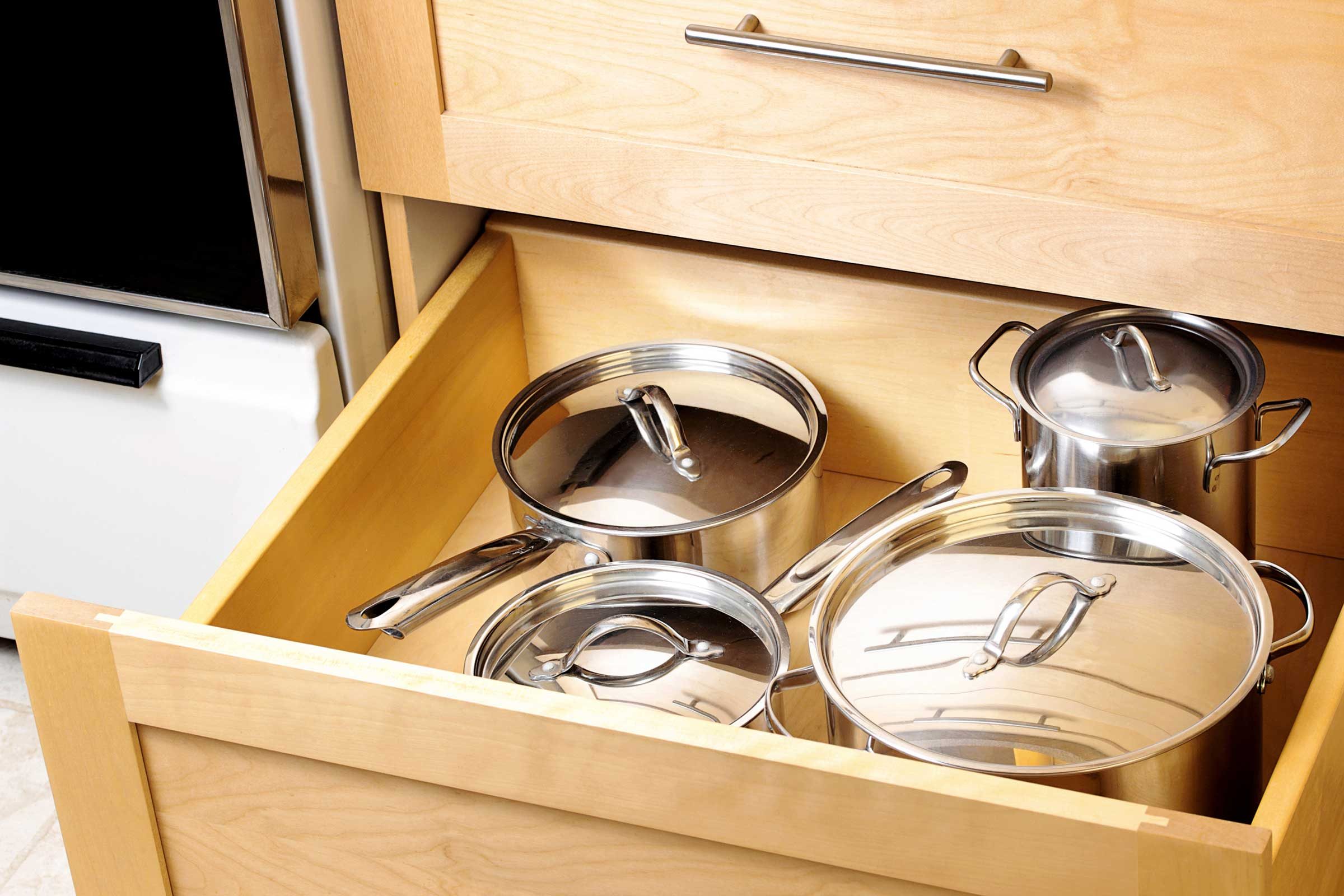 storing pots and pans under the kitchen sink
