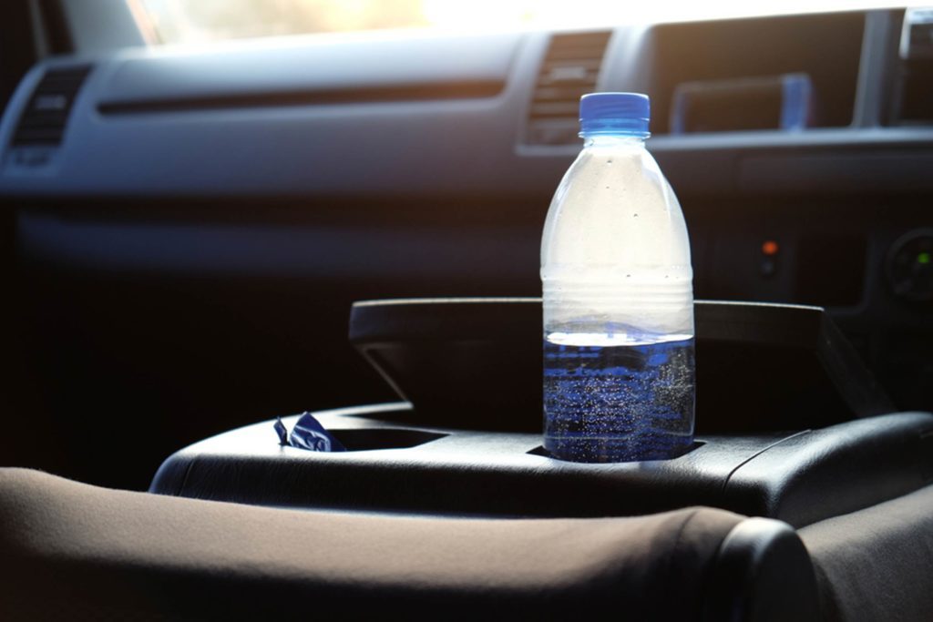 Plastic Water Bottles Left In The Sun Could Set Your Car On Fire - Here's  How