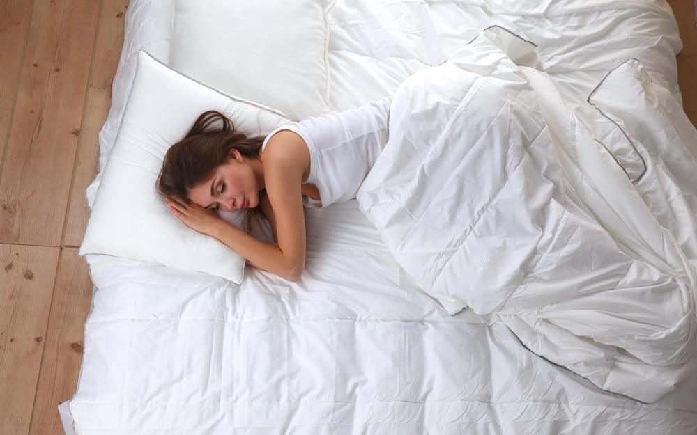 This Is The Healthiest Sleep Position According To