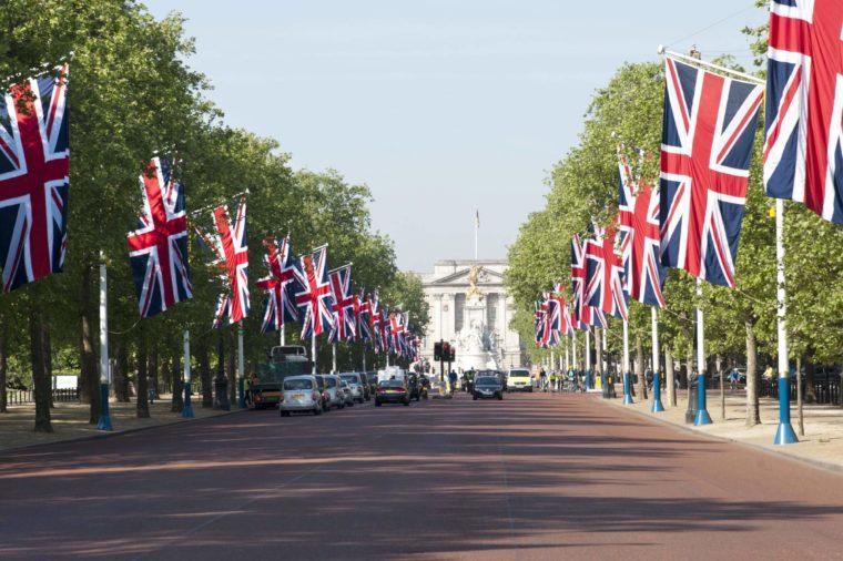 Union Jack flags lining the Mall towards Buckingham Palace for state occasion, London, England, Britain