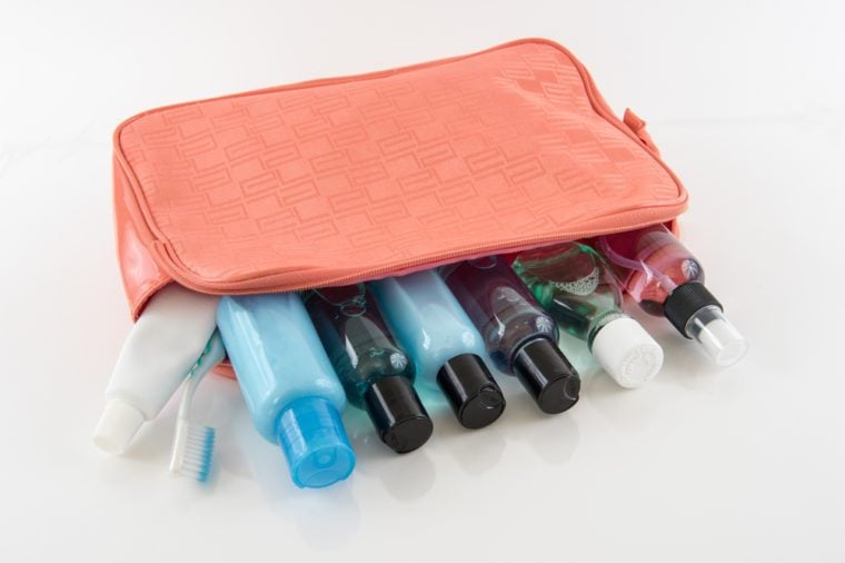 Orange Travel Toiletry Bag with Travel Toiletries