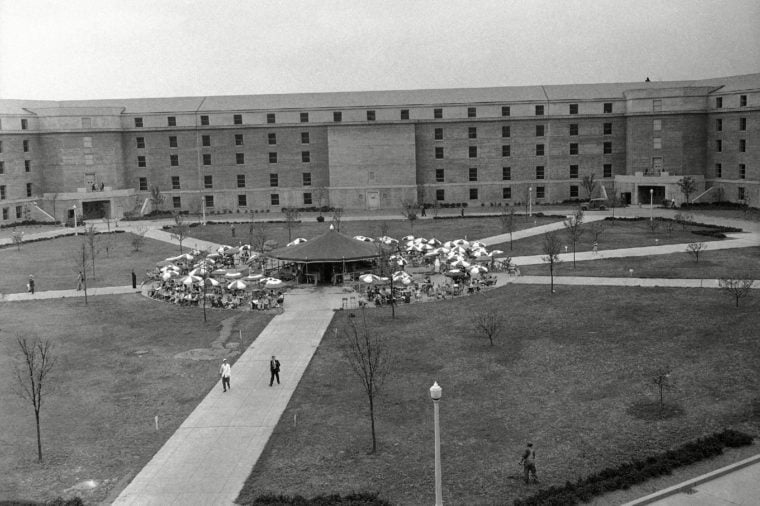 General view of the court in the Pentagon Building in Washington, showing the restaurant surrounded by umbrella covered tables where employees enjoy outdoor lunches