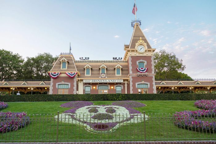 Disneyland Railroad Station, front Mickey mouse made out of flowers, Disneyland Resort, Anaheim, California, USA