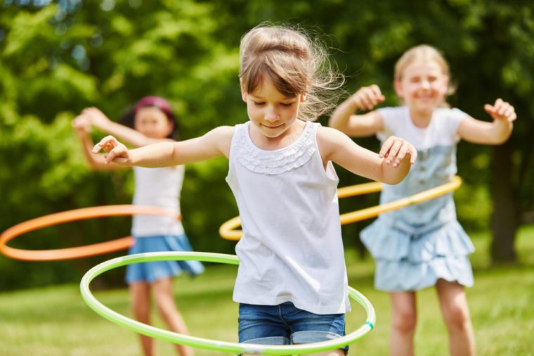 Children playing with hoops in the park