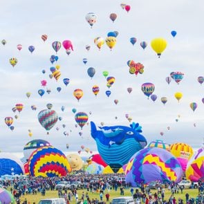 Balloons fly over Albuquerque on October 11, 2014 in Albuquerque, New Mexico. Albuquerque balloon fiesta is the biggest balloon event in the world.