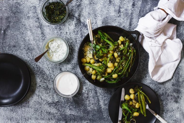 Gnocchi and broccolini serve up plates eating food concept 