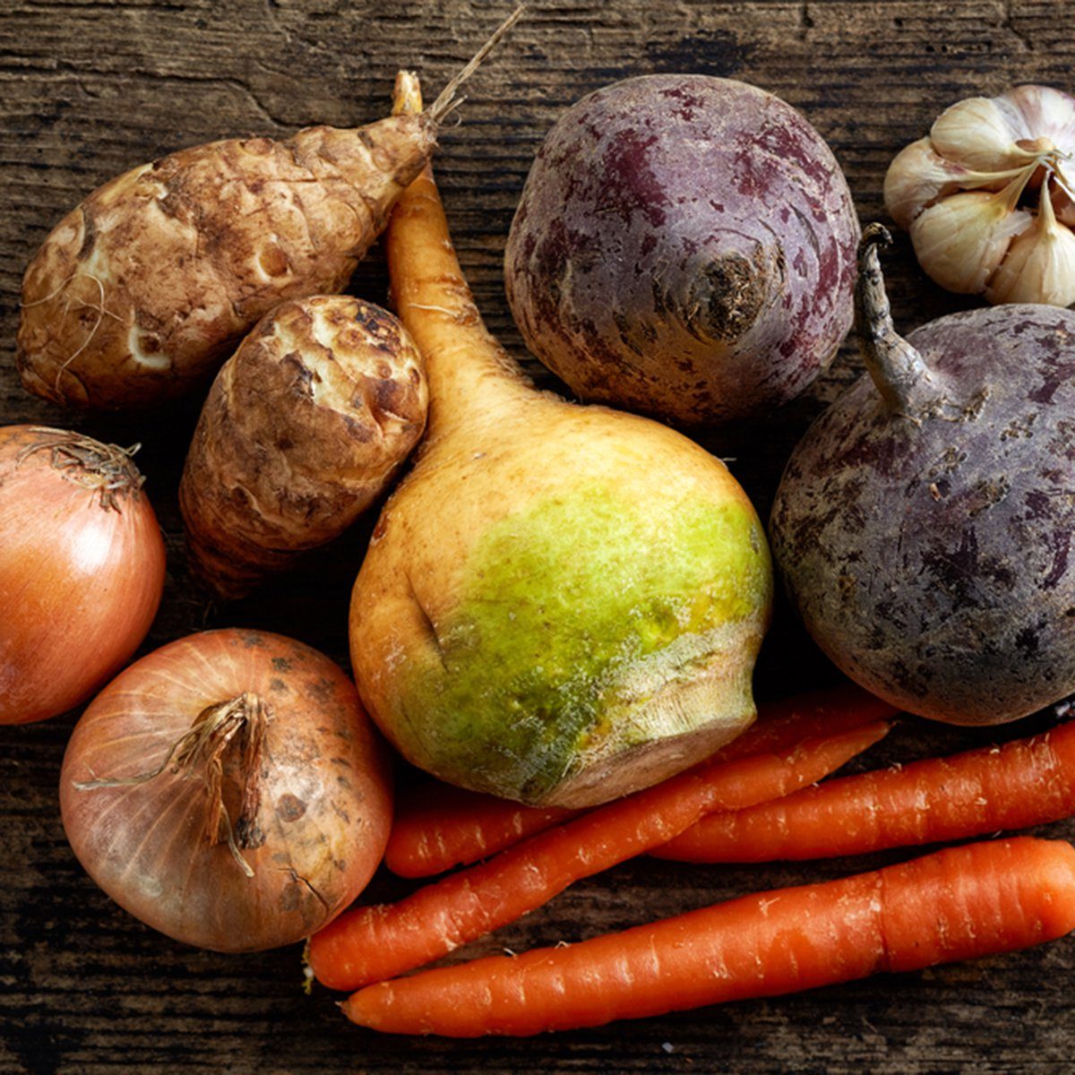 various fresh raw vegetables on wooden table