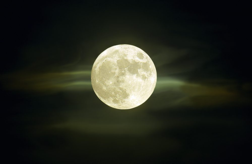 Full moon with clouds at summer midnight