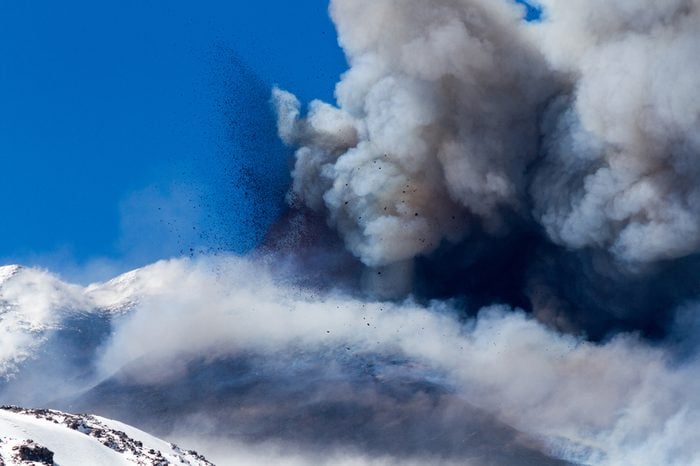 Volcano etna eruption with explosion and ash emission