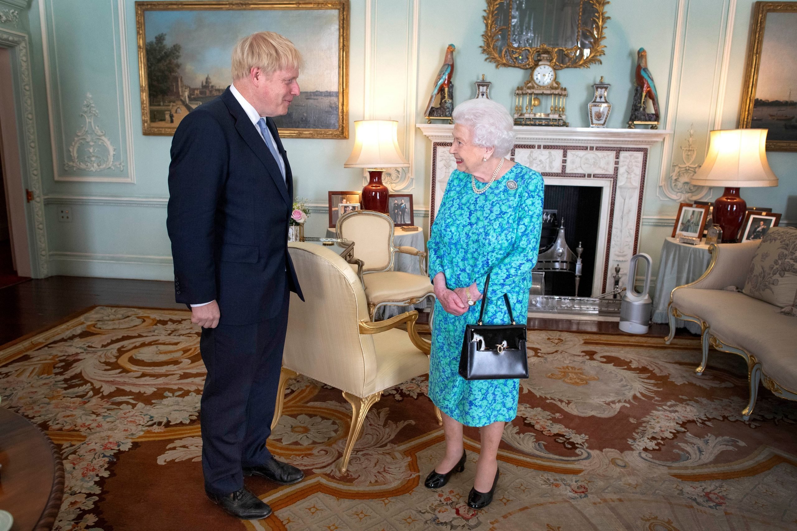 Britain's Queen Elizabeth II and boris johnson having a conversation