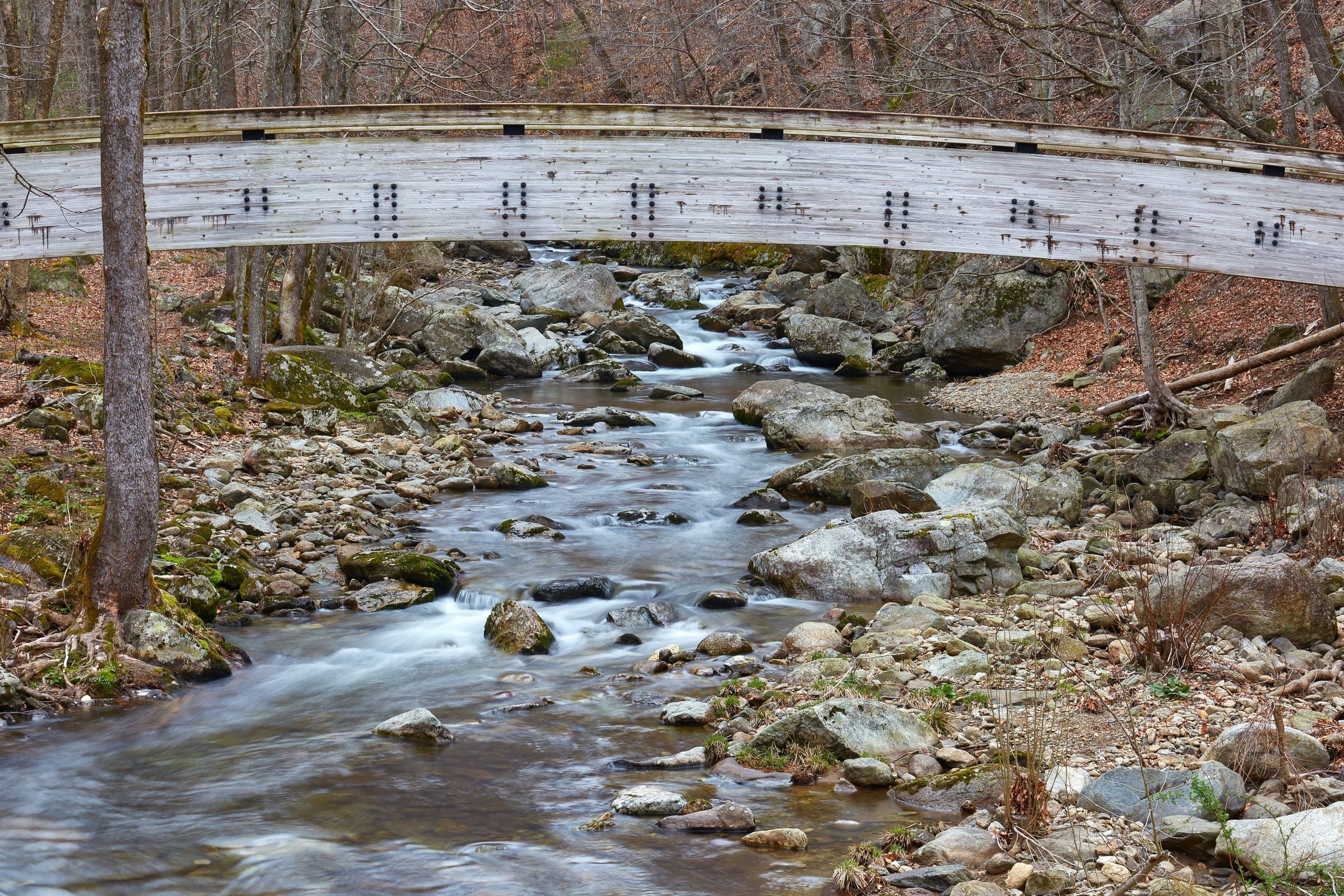 View of the Tye River and a footbridge at Crabtree Falls Recreation Area near Montebello, Virginia