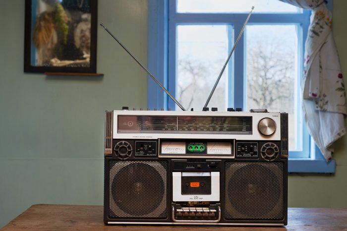 Dusty old radio with one cassette player recorder in rural environment