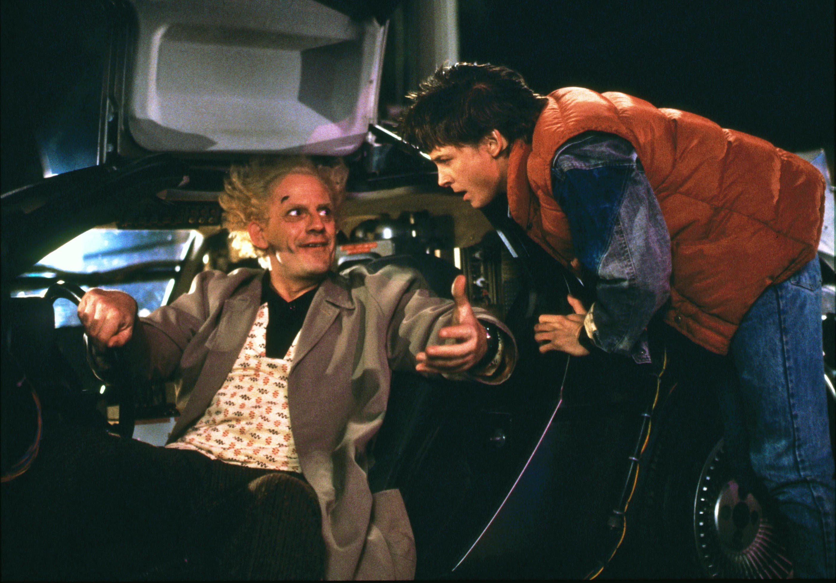 Editorial use only. No book cover usage. Mandatory Credit: Photo by Amblin Entertainment/Universal Pictures/Kobal/Shutterstock (5886092ab) Christopher Lloyd, Michael J. Fox Back To The Future - 1985 Director: Robert Zemeckis Amblin Entertainment/Universal Pictures USA Scene Still Scifi Retour vers le futur