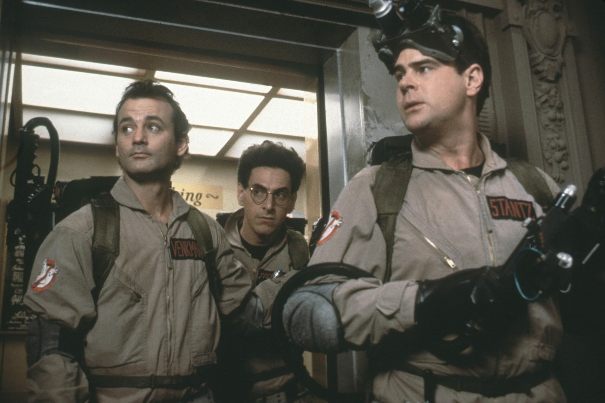 Editorial use only. No book cover usage. Mandatory Credit: Photo by Columbia/Kobal/Shutterstock (5885744d) Bill Murray, Harold Ramis, Dan Aykroyd Ghostbusters - 1984 Director: Ivan Reitman Columbia USA Scene Still S.O.S. Fantômes