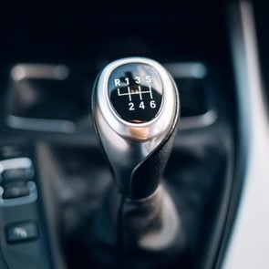 Manual gearbox handle in the car 