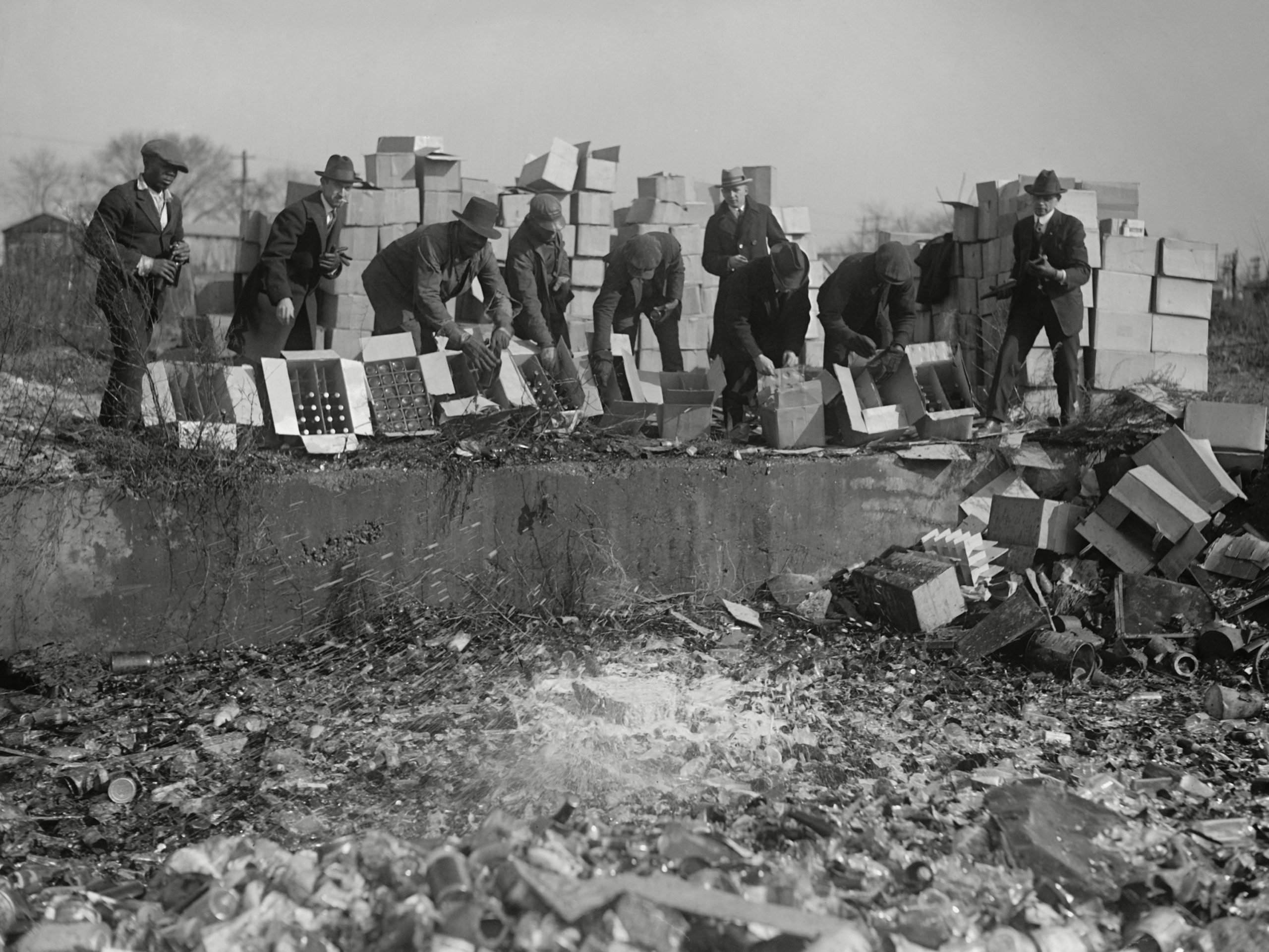 Mandatory Credit: Photo by Everett/Shutterstock (10112301a)<br /> Government agents destroying whiskey and beer during Prohibition. Washington, DC area, Nov. 20, 1923