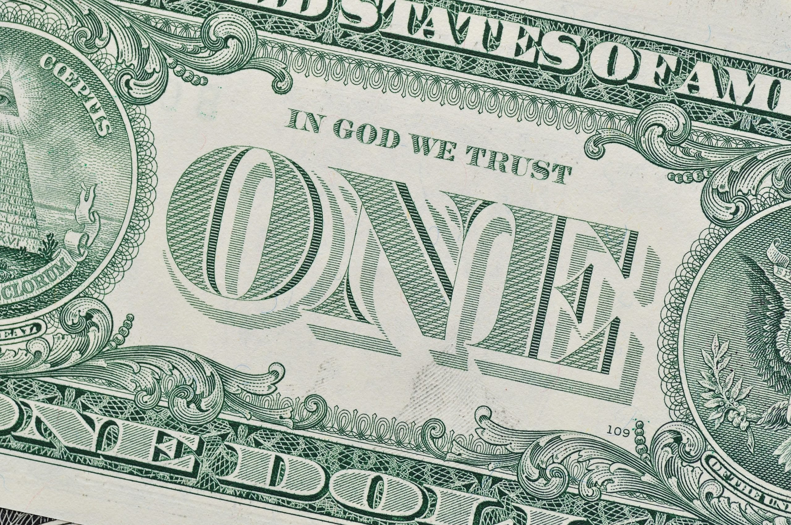 Detail of one dollar bill.
