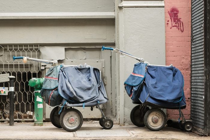 Mail carts on the sidewalk