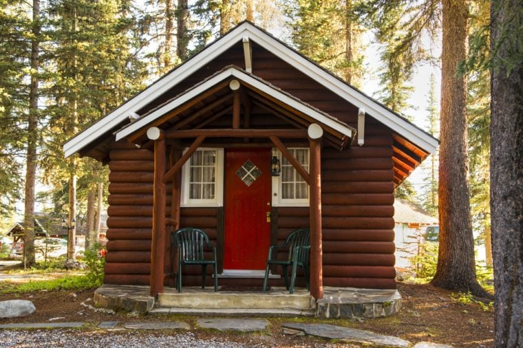 Log cabin in woodland setting