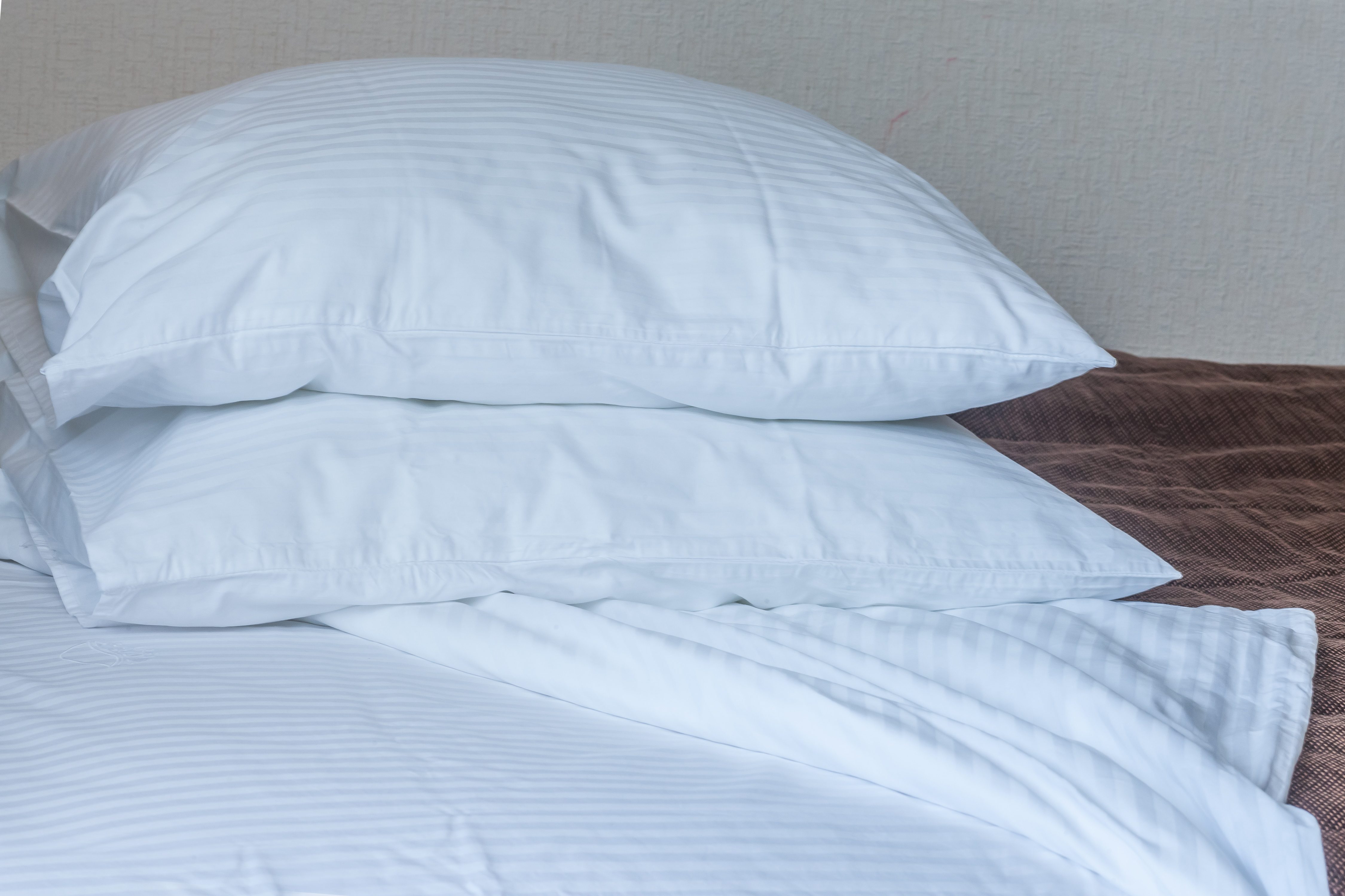 How Often Should You Wash Your Pillows? Reader's Digest