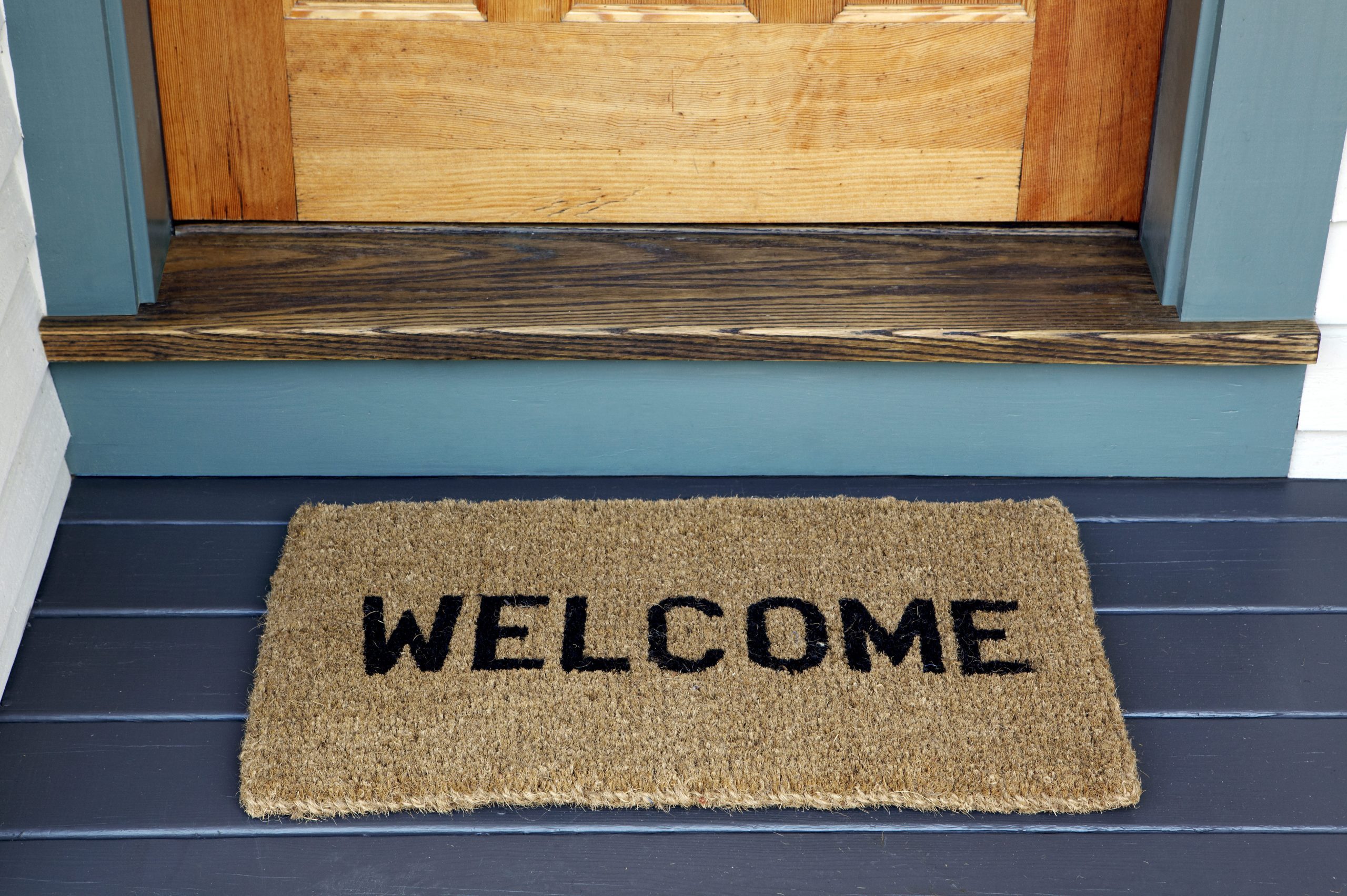 Here's How Often You Should Be Cleaning Your Welcome Mat | Reader's Digest
