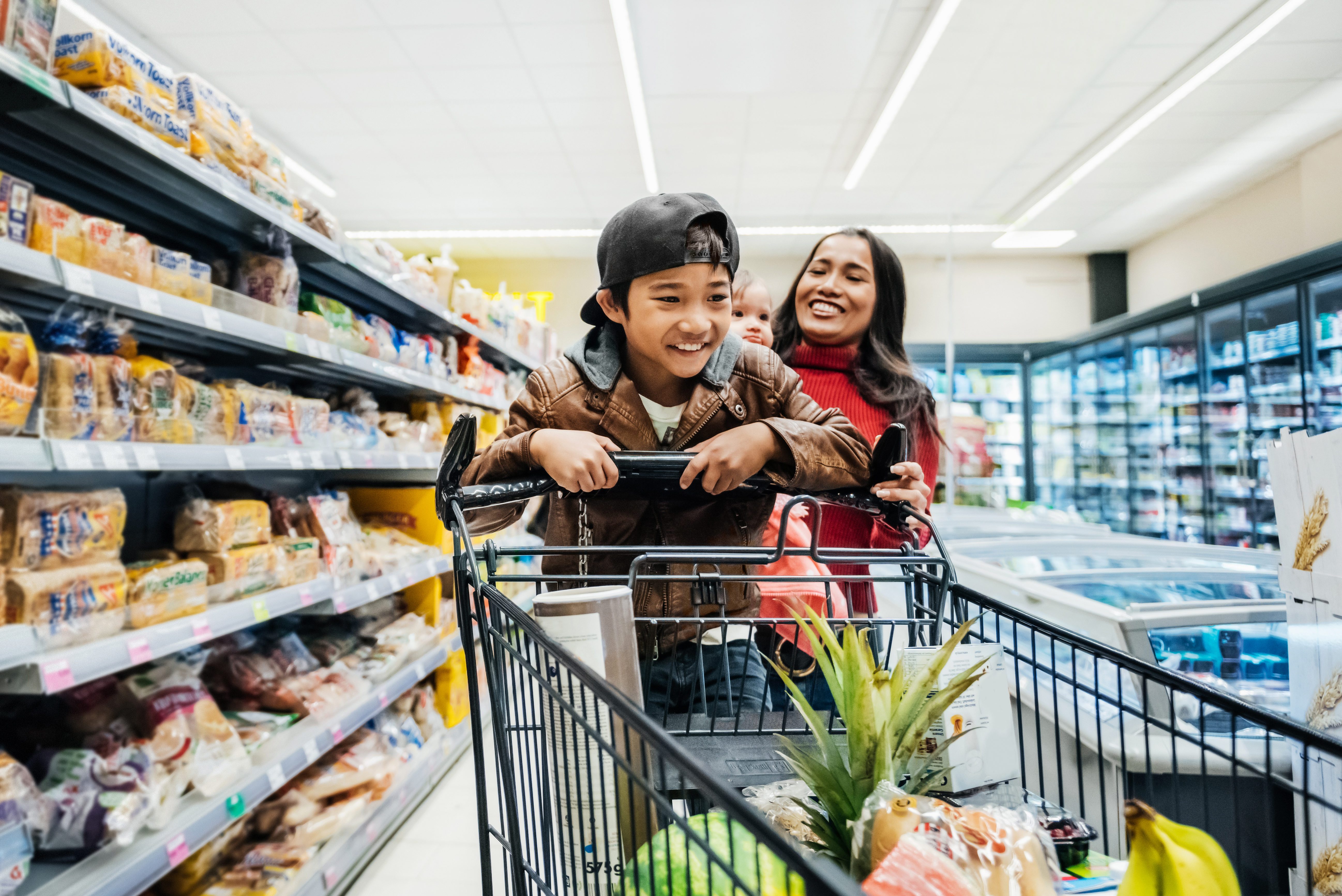 Family Having Fun While Out Buying Groceries.