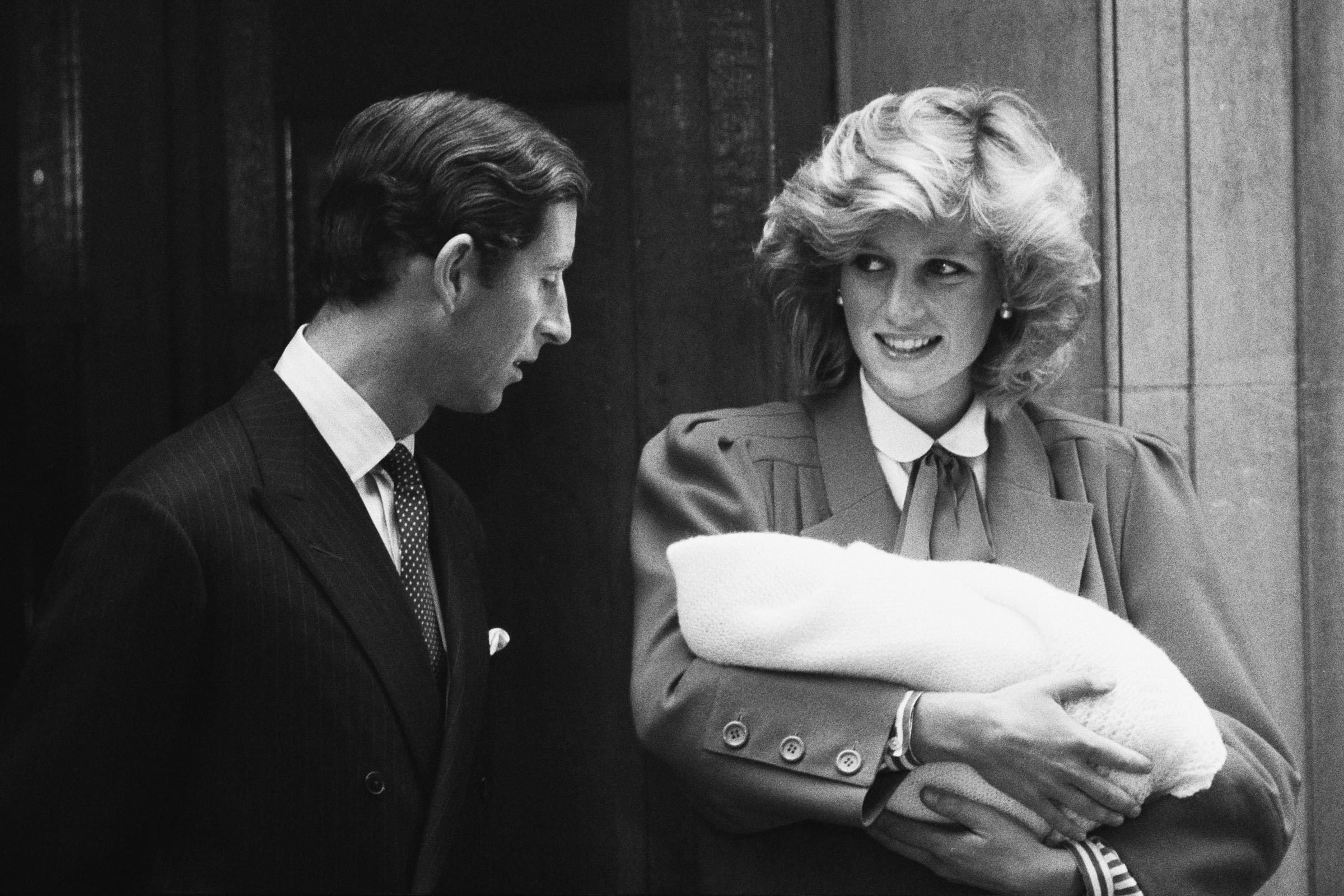 Charles, Prince of Wales and Diana, Princess of Wales (1961-1997) leave the Lindo Wing of St Mary's Hospital with their son Prince Harry, in Paddington, London, 16th September 1984