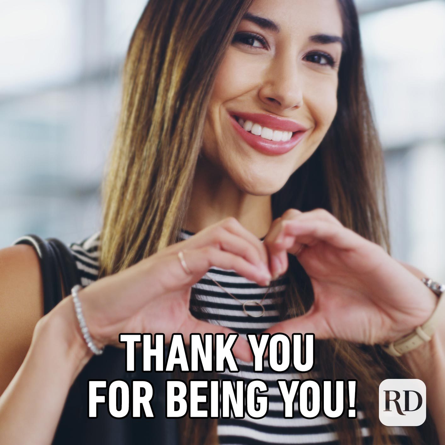 Woman holding hands in a heart shape. Meme text: Thank you for being you!