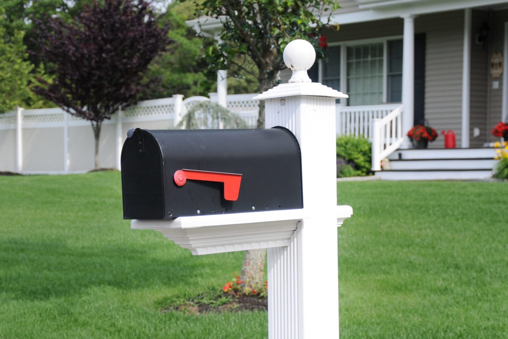 Closed Suburban Residential Mailbox Lush Green Lawn