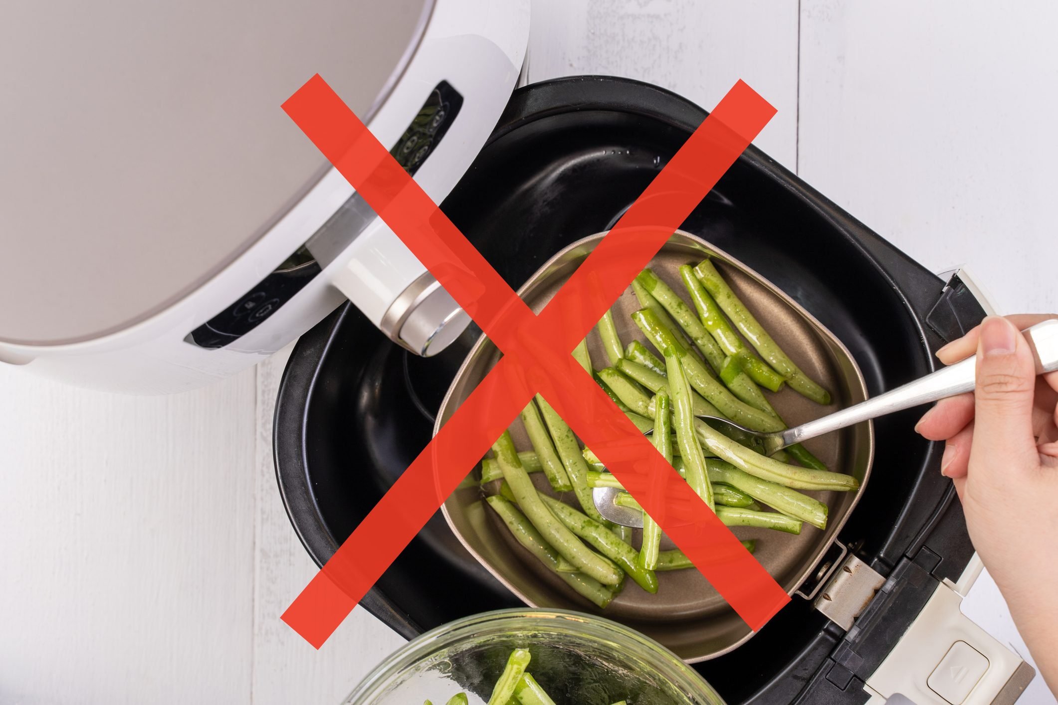 https://www.rd.com/wp-content/uploads/2021/01/Things-You-Probably-Shouldnt-Cook-in-an-Air-Fryer-GettyImages-1239713606-INSJOY.jpg