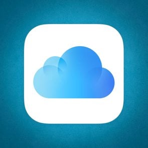 iCloud logo on blue paper background