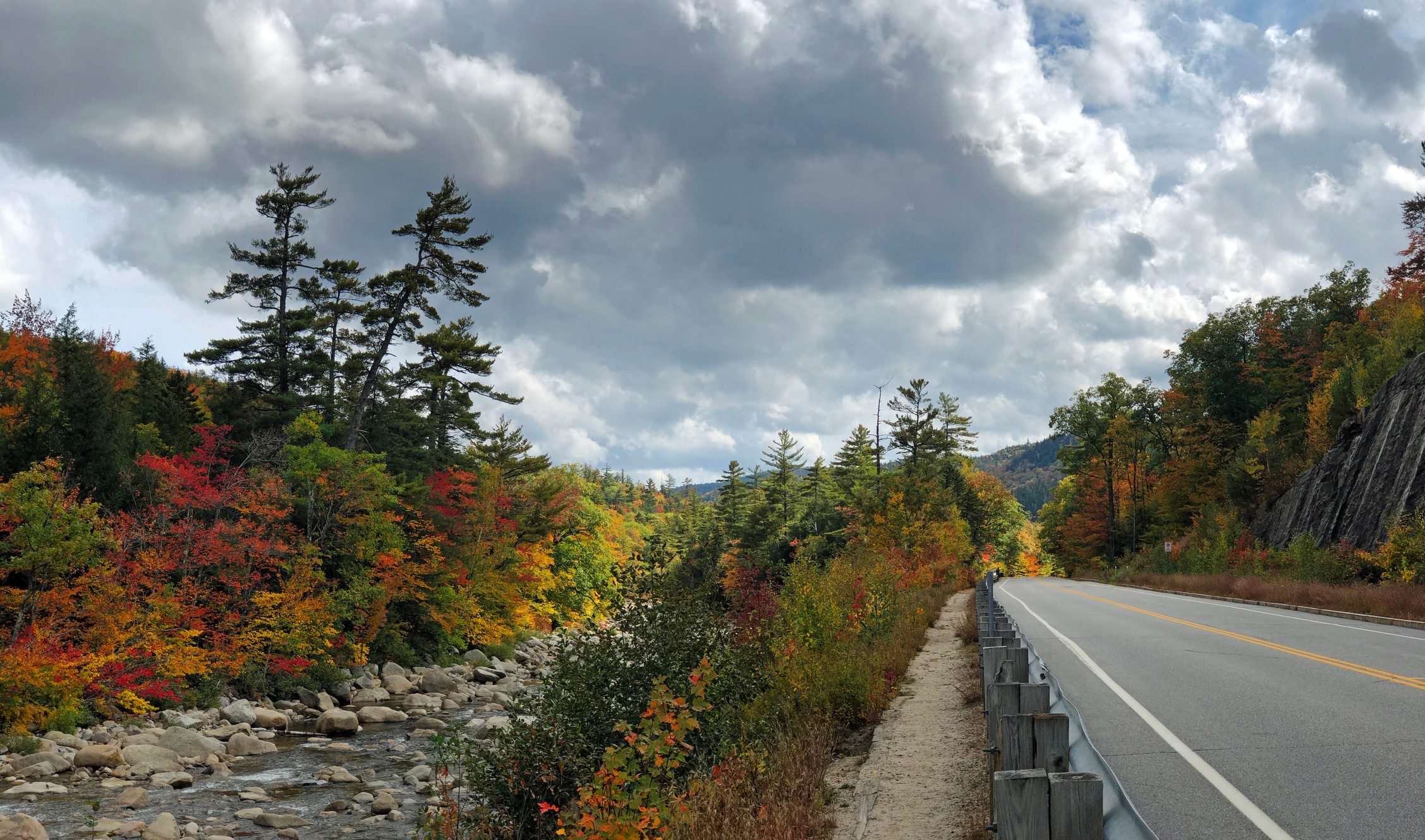 Kancamangus Highway in the New Hampshire White Mountains running alongside the Swift River during Autumn