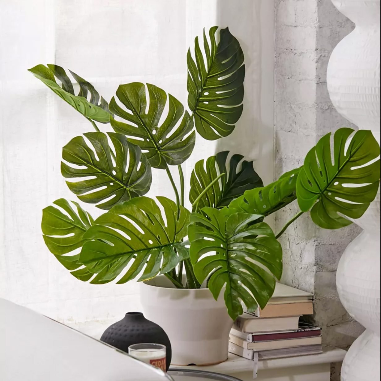 11 Best Fake Plants That Look Real Reader S Digest   Fakemonstera 