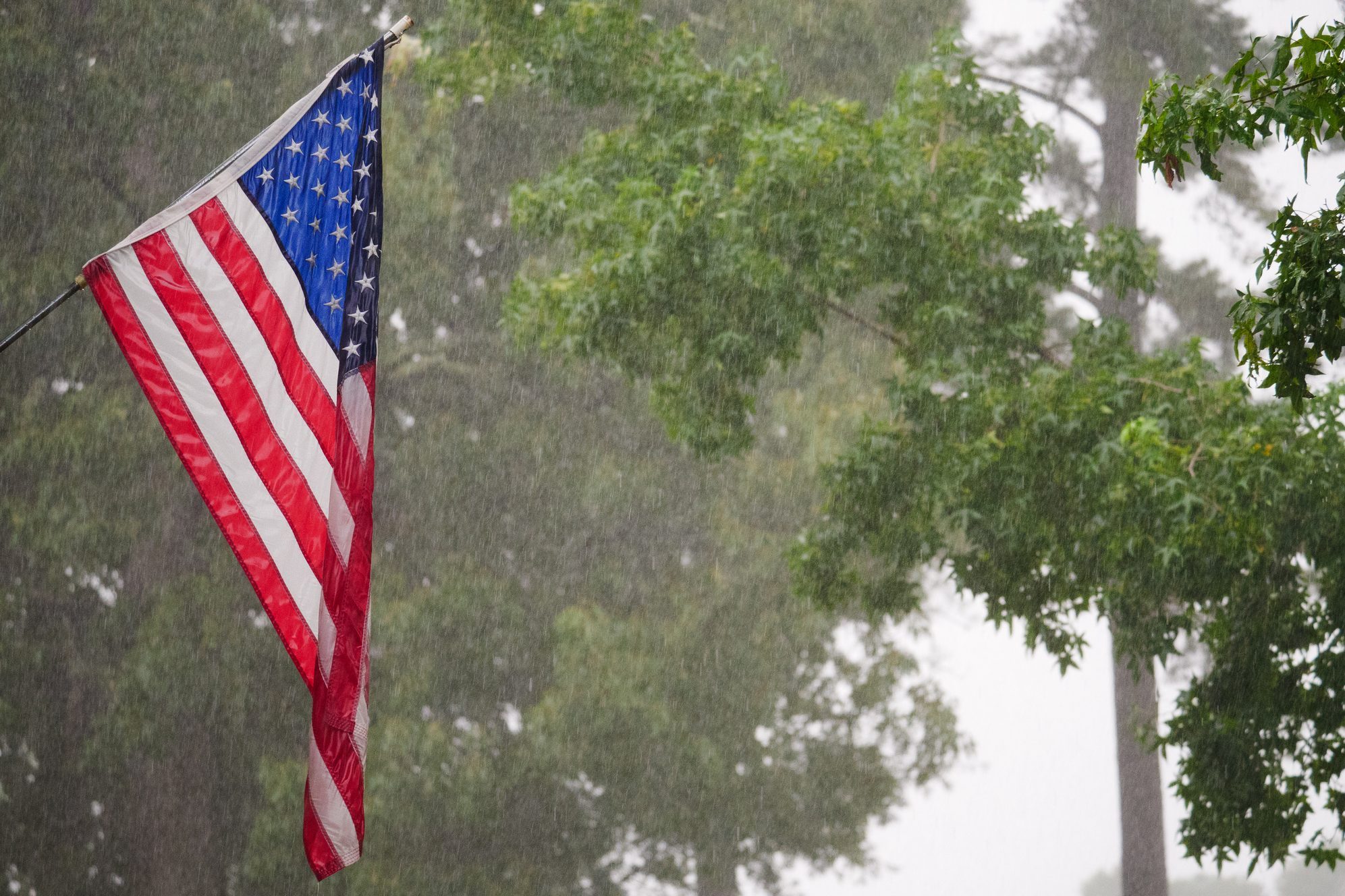 United States Flag in Rain Storm