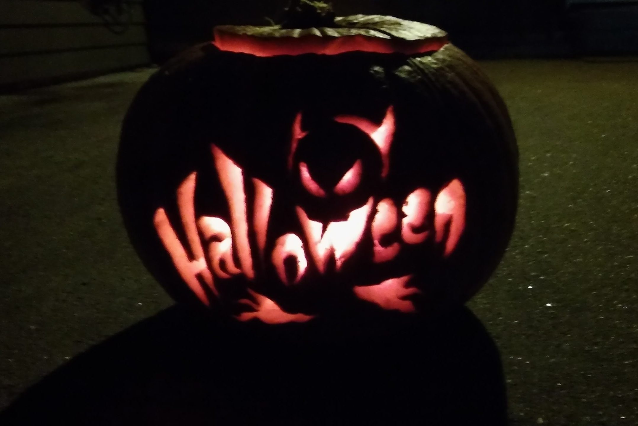 Close-Up Of Illuminated Jack-O-Lantern On Street