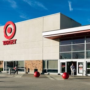 exterior of a target store with large red balls in front of the entrance