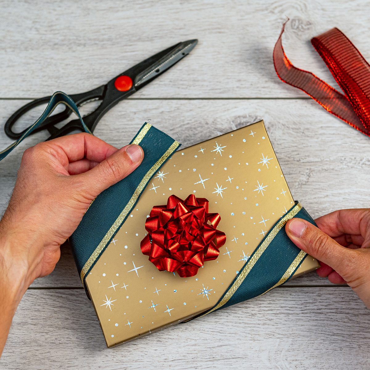Gift Wrapping Process With Box Scissors And Thread From Above Flat