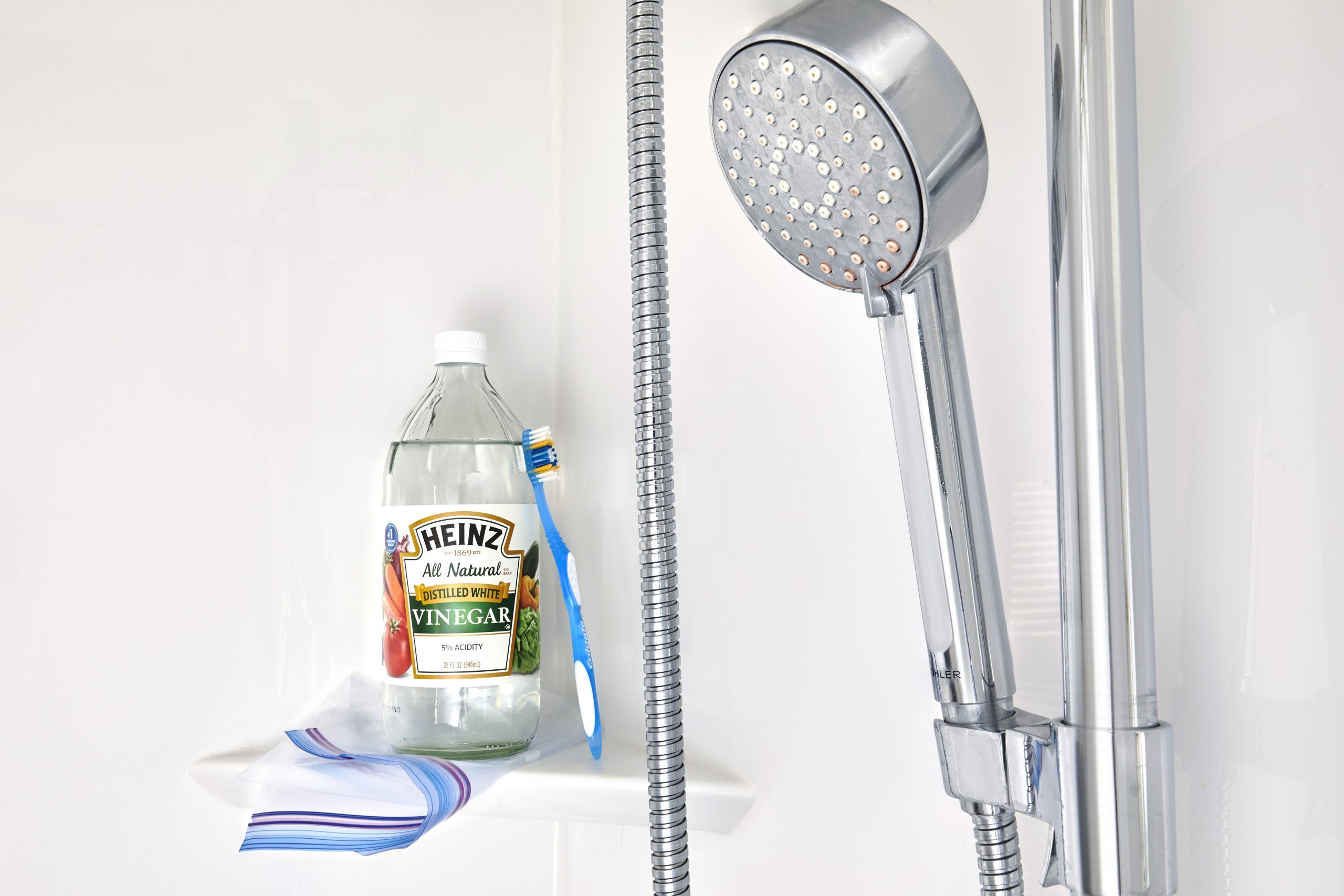 The Easiest Way To Clean A Showerhead Without Removing It - Small Stuff  Counts