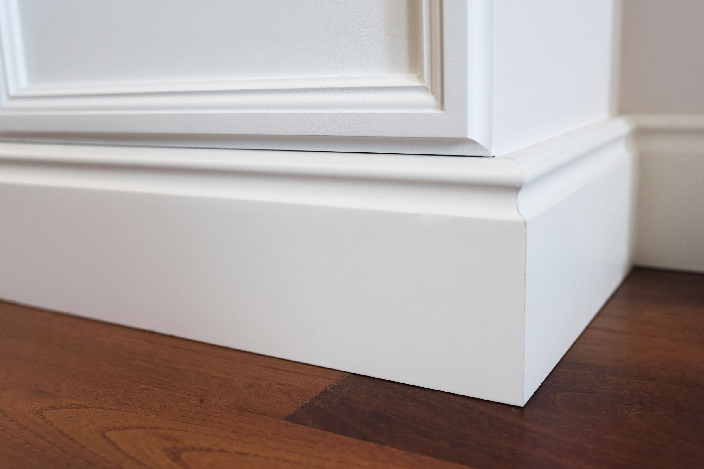 https://www.rd.com/wp-content/uploads/2022/03/how-to-clean-baseboards-GettyImages-1190699955-MLedit.jpg?fit=700%2C1024