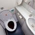 What Actually Happens When You Flush an Airplane Toilet?