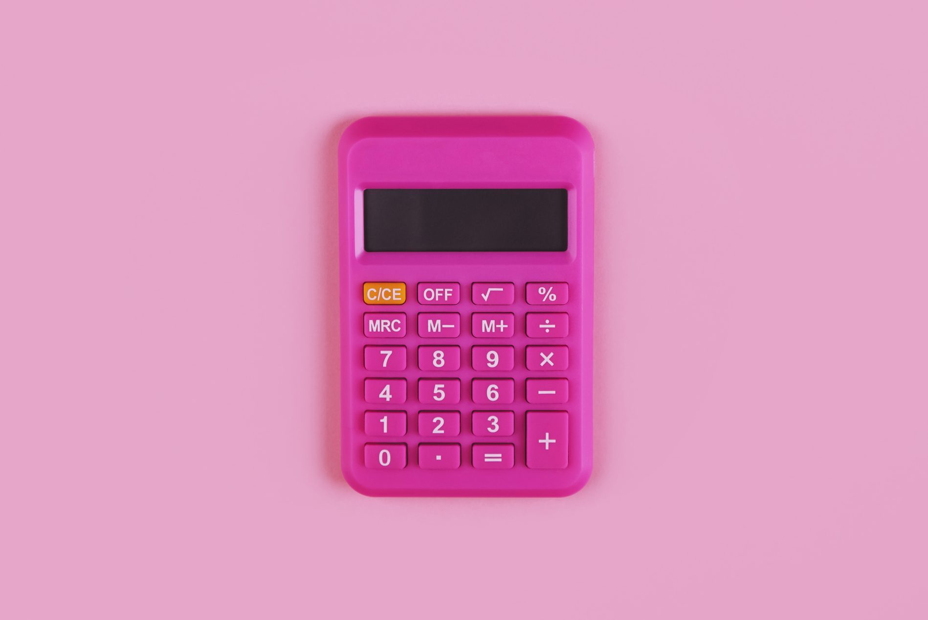 Bright pink calculator on a pink background