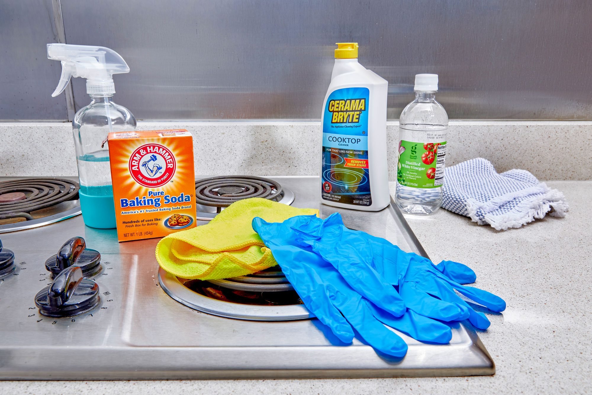The Secret To Cleaning Your Stove May Be Just A Lift Away