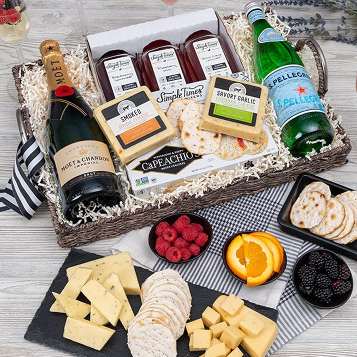 https://www.rd.com/wp-content/uploads/2023/03/Gourmet-Gift-Baskets-Champagne-and-Mimosa-Basket_ecomm_via-gourmetgiftbaskets.com_.jpg?fit=700%2C700