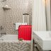 Here's Why You Should Put Luggage in Your Hotel Room's Bathtub, According to Experts