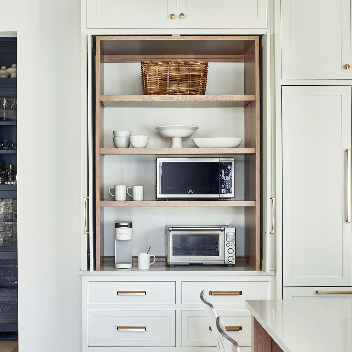 Appliance garages, pull-out shelves help organize kitchen