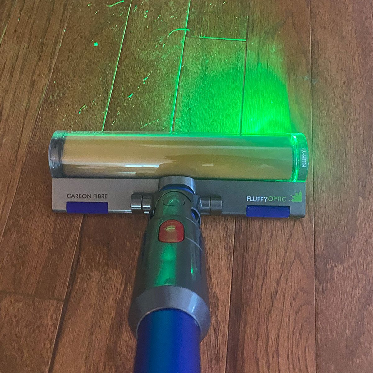 Dyson Gen5outsize emitting Green Light on Floor