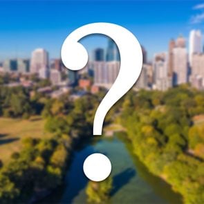 atlanta georgia skyline slightly blurred with a white question mark on top