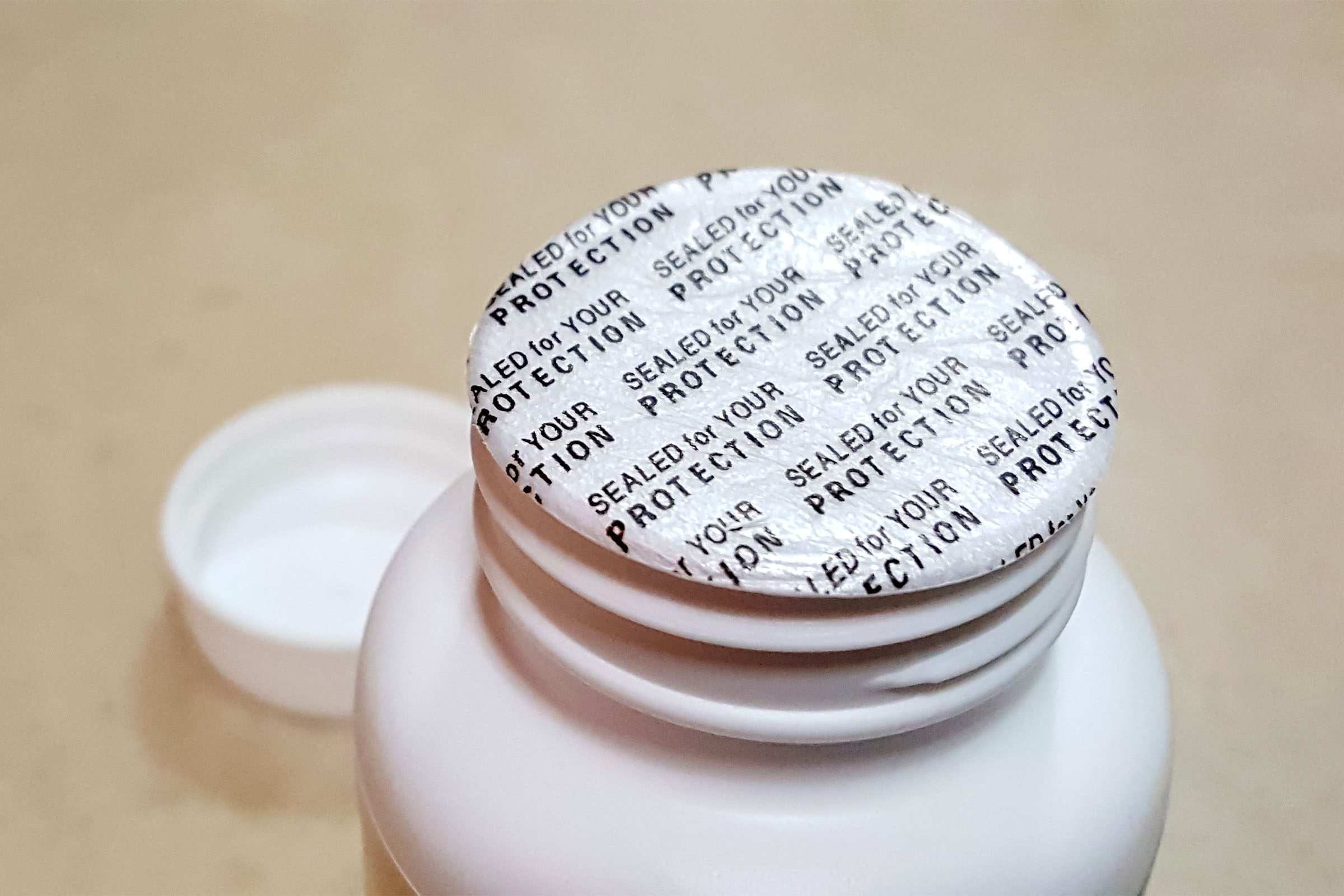 Tamper-evident seal over a medicine bottle