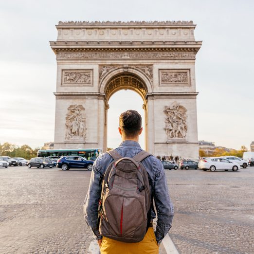 https://www.rd.com/wp-content/uploads/2023/11/Tourist-with-backpack-walking-towards-Arc-de-Triomphe-in-Paris-France-GettyImages-1136583486.jpg?resize=522%2C522&w=680